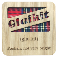 Load image into Gallery viewer, Wooden Mug Coaster with 'Glaikit' text with tartan background