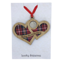 Load image into Gallery viewer, Wooden Plaque shaped with two hearts joined with lucky sixpence and tartan background