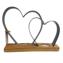 Load image into Gallery viewer, Candle holder with heart-shaped metal design on a wooden base
