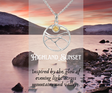 Load image into Gallery viewer, Silver necklace with a yellow gemstone pendant over a scenic image of a sunset over water.