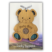 Load image into Gallery viewer, Wooden Plaque in the shape of a bear with tartan feet and lucky sixpence in the centre