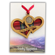 Load image into Gallery viewer, Wooden Plaque shaped with two hearts joined with lucky sixpence and tartan background