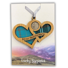 Load image into Gallery viewer, Wooden Plaque shaped with two hearts joined with lucky sixpence and tartan background