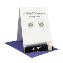 Load image into Gallery viewer, Scottish Bagpipes-themed silver earrings on a branded card with a white background
