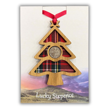 Load image into Gallery viewer, Christmas Tree Lucky Sixpence on an oak veneered surround and a Royal Stewart tartan background