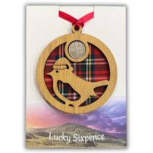Load image into Gallery viewer, Christmas Robin Bauble Lucky Sixpence on an oak veneered surround and a Royal Stewart tartan background