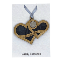 Load image into Gallery viewer, Wooden Plaque shaped with two hearts joined with lucky sixpence and tartan background, engraved with You Are Loved
