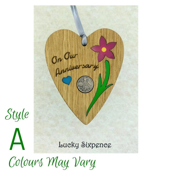 Wooden Plaque floral design and lucky sixpence in the centre