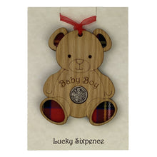 Load image into Gallery viewer, Wooden Plaque in the shape of a bear with tartan feet and lucky sixpence in the centre