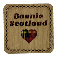Load image into Gallery viewer, Wooden Mug Coasert Scottish Themed Gift with 'Bonnie Scotland' in tartan text