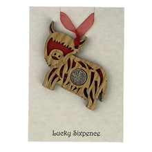 Load image into Gallery viewer, Lucky Sixpence Wooden Plaque in the shape of a highland cow
