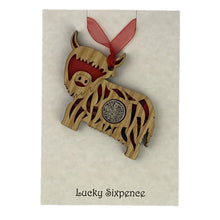Load image into Gallery viewer, Lucky Sixpence Wooden Plaque in the shape of a highland cow