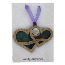 Load image into Gallery viewer, Wooden Plaque shaped with two hearts joined with lucky sixpence and tartan background