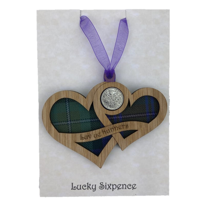 Wooden Plaque shaped with two hearts joined with lucky sixpence and tartan background