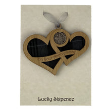Load image into Gallery viewer, Wooden Plaque shaped with two hearts joined with lucky sixpence and tartan background