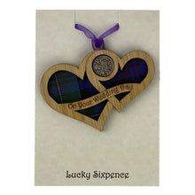 Load image into Gallery viewer, Wooden Plaque shaped with two hearts joined with lucky sixpence and tartan background