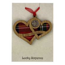 Load image into Gallery viewer, Wooden Plaque shaped with two hearts joined with lucky sixpence and tartan background