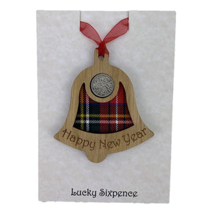 Happy New Year Bell Lucky Sixpence on an oak veneered surround and a Royal Stewart tartan background