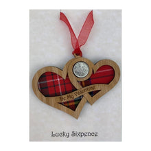 Load image into Gallery viewer, Wooden Plaque shaped with two hearts joined with lucky sixpence and tartan background, engraved with Be My Valentine