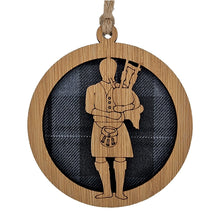 Load image into Gallery viewer, Round hanging plaque with a tartan background