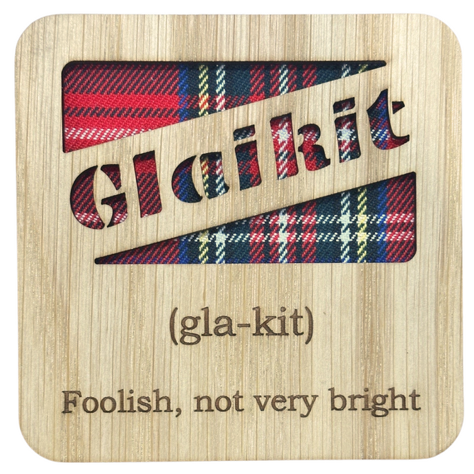 Wooden Mug Coaster with 'Glaikit' text with tartan background