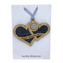 Load image into Gallery viewer, Wooden Plaque shaped with two hearts joined with lucky sixpence and tartan background
