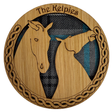 Load image into Gallery viewer, Round Wooden Mug Coaster with tartan background and kelpie design
