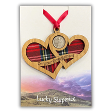 Load image into Gallery viewer, Wooden Plaque shaped with two hearts joined with lucky sixpence and tartan background
