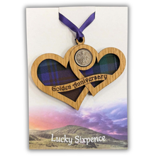 Load image into Gallery viewer, Wooden Plaque shaped with two hearts joined with lucky sixpence and tartan background
