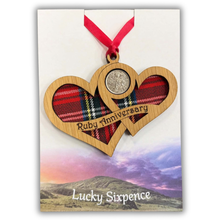 Load image into Gallery viewer, Wooden Plaque shaped with two hearts joined with lucky sixpence and tartan background
