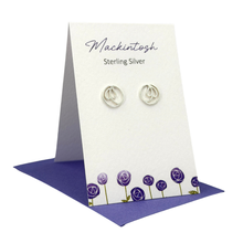 Load image into Gallery viewer, Silver earrings on a Mackintosh branded card with leaf design
