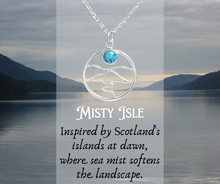 Load image into Gallery viewer, Necklace with a pendant inspired by Scotland's islands at dawn, over a scenic lake and mountains background.
