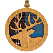 Load image into Gallery viewer, Round hanging plaque with a tartan background
