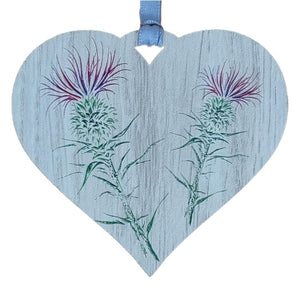 A Hanging Heart Plaque With A Colourful Design