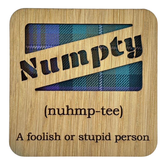 Wooden Mug Coaster with 'Numpty' text with tartan background