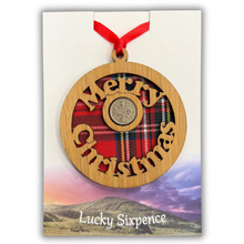 Load image into Gallery viewer, Merry Christmas Lucky Sixpence on an oak veneered surround and a Royal Stewart tartan background
