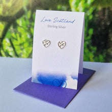 Load image into Gallery viewer, A pair of sterling silver stud earrings with a Scottish saltire design, displayed on a card with the text 'Love Scotland Sterling Silver'.
