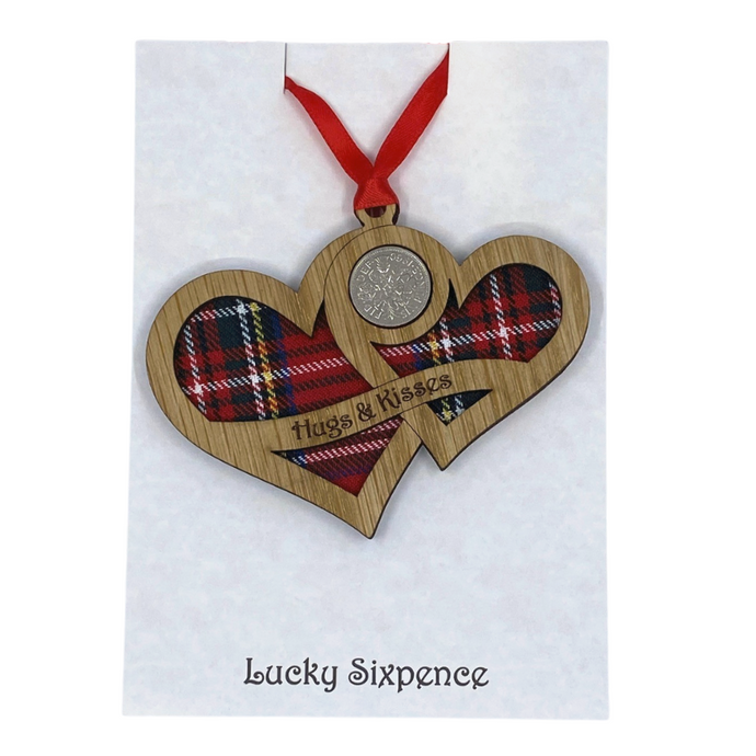 Wooden Plaque shaped with two hearts joined with lucky sixpence and tartan background, engraved with Hugs & Kisses