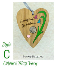 Load image into Gallery viewer, Wooden Plaque floral design and lucky sixpence in the centre
