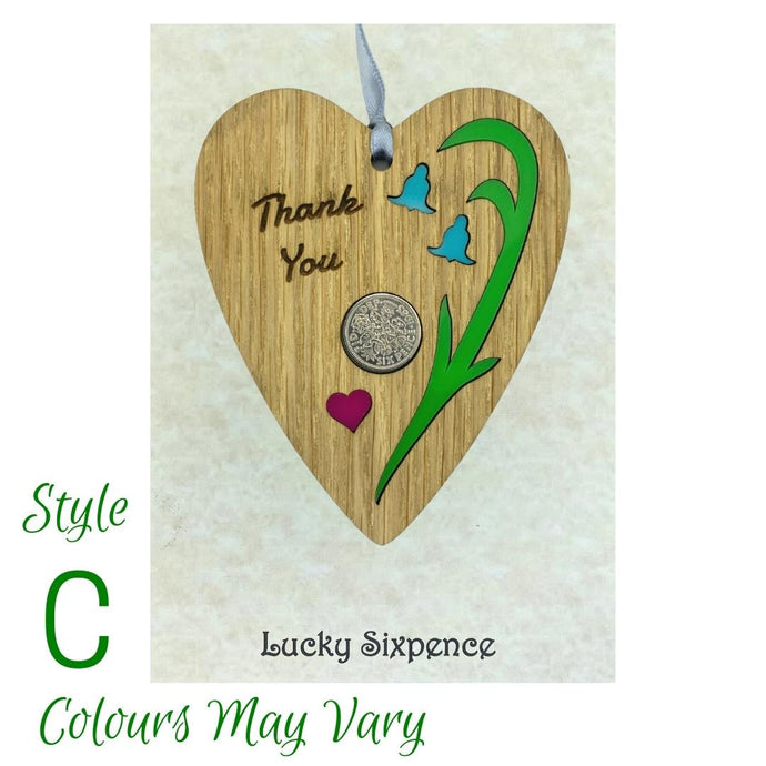 Wooden Plaque floral design and lucky sixpence in the centre