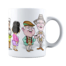 Load image into Gallery viewer, An 11oz ceramic mug that has a design around it showcasing the auld gang! Not dishwasher safe.

