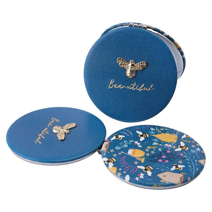 A beautiful and sassy compact mirror to compliment any hand bag!