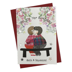 Scottish Birthday Card with "Och It's Yer Birthday Gie's A Squeeze" and two friends hugging on a bench on the front