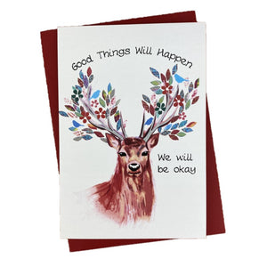 Scottish card with a floral and tartan stag design on the front