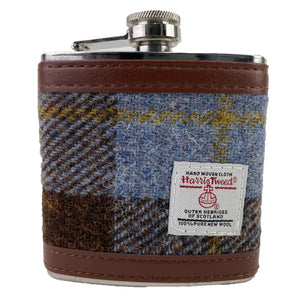 Harris Tweed Hip Flask with brown leather embroidery, silver top and white Harris Tweed label in the centre 