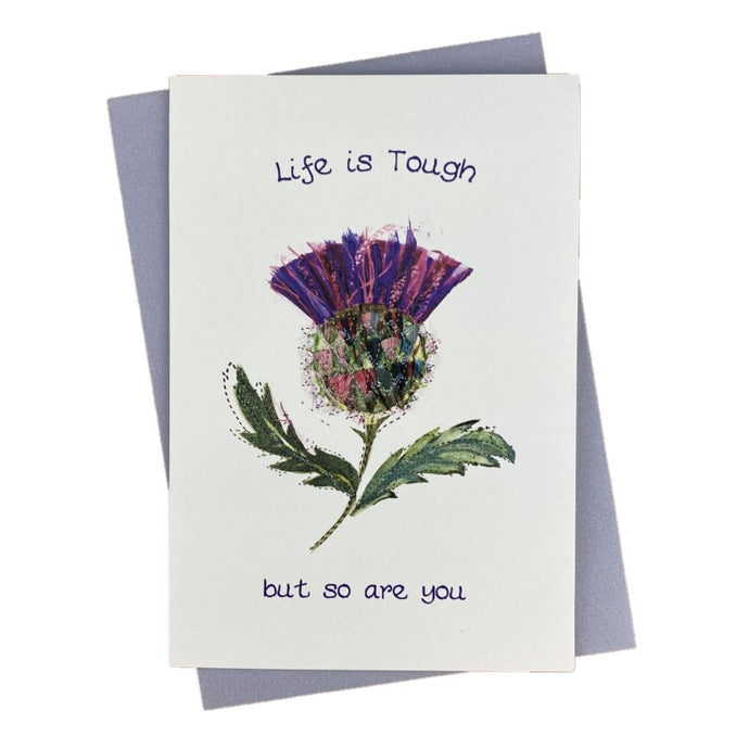 Scottish card with a tartan thistle design on the front