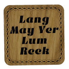 Load image into Gallery viewer, Wooden Mug Coaster with &#39;Lang May Yer Lum Reek&#39; text
