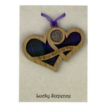 Load image into Gallery viewer, Wooden Plaque shaped with two hearts joined with lucky sixpence and tartan background
