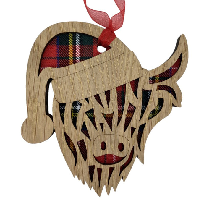 Christmas Coo Head Hanging Plaque on an oak veneered surround and a Royal Stewart tartan background.