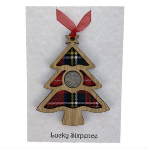 Christmas Tree Lucky Sixpence on an oak veneered surround and a Royal Stewart tartan background